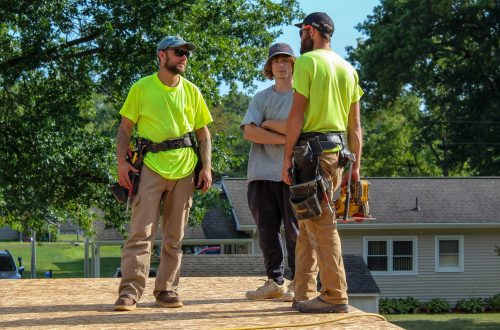Construction Workers Holding a Meeting at Job Site